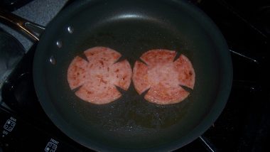 Pork_roll_slices_frying.JPG
